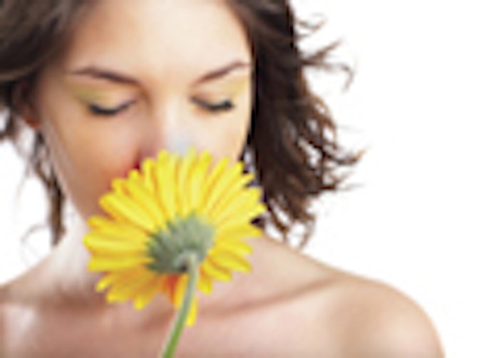 Beautiful angelic woman smelling a flower - check out my portfolio for more pictures