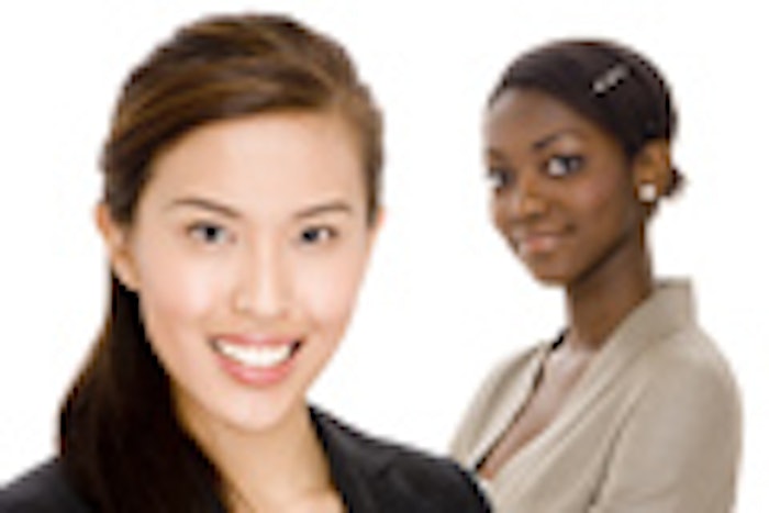 A chinese businesswoman standing in front of her colleague