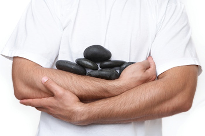 male_esthetician_stones_is