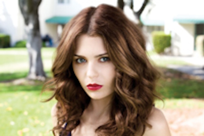Red lips and played-down eyes ruled the fashion runways for Fall 2010.