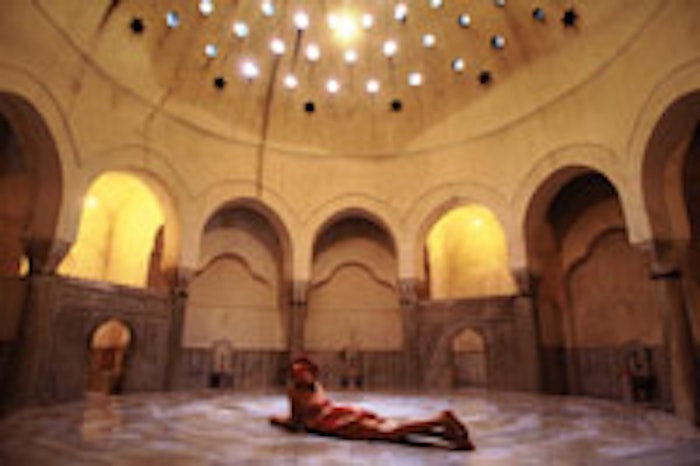 Cemberlitas Hamam features a large dome in the hararet and natural light streaming through glass pinpoints called elephant eyes.