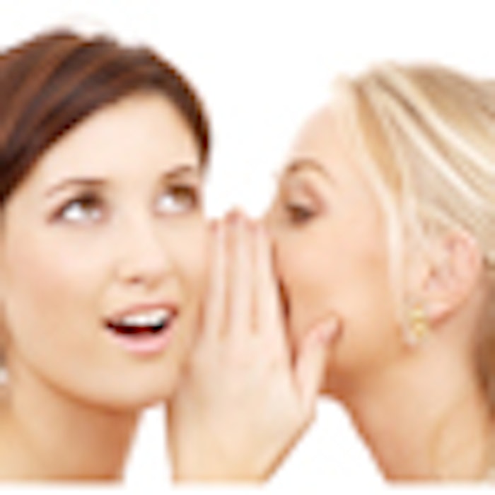 2women_whispering