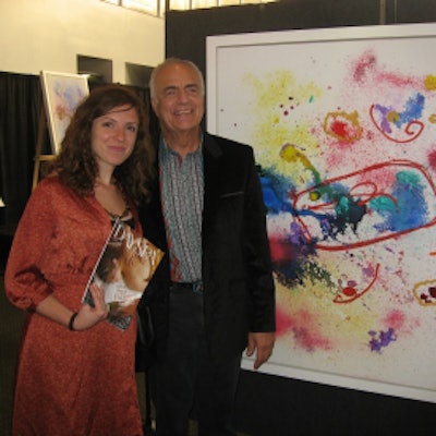 Dr. Murad showing me the finished version of an installment of the “Joy” cycle, which we featured on page 34 of our November issue!