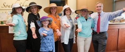 A Massachusetts spa/skin center opens its arms to children with melanoma.