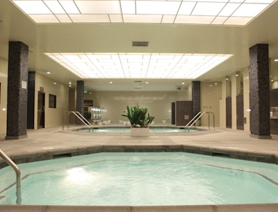the communal men’s shower area at Wi Spa
