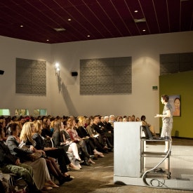 Jane Wurwand addresses an in-person and virtual crowd about the power of connectivity.