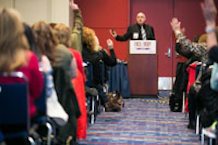 Dermalogica District Manager, Aaron Sonnenschein is photographed at the Face & Body Midwest Spa Conference & Expo 2013, where he presented valuable industry insights for “Planning for a Profitable Year.” An estimated 125 industry professionals attended the presentation.