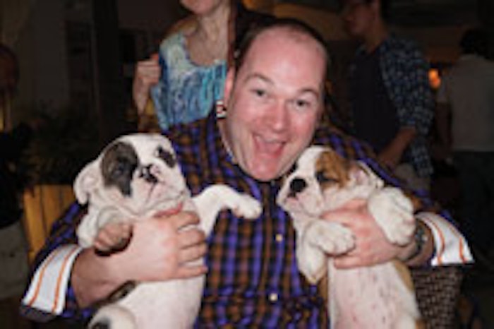 Michael Q. Pugliese, CEO of Circadia by Dr. Pugliese poses with two other attendees at the Pretty and Paws event.