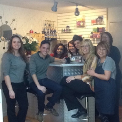 Contest winner Karen Houshultz (3rd from rt) and staff at Apple Day Spa’s smoothie bar