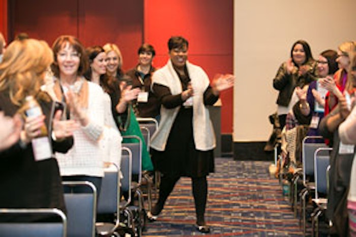 JoElle Lee excites the crowd in the Opening Session.
