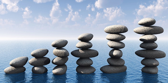row of stones in water