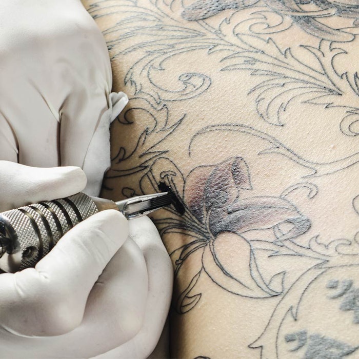 SI1509_News_womantattoo_850