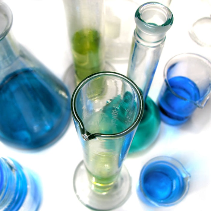 Laboratory glassware on white