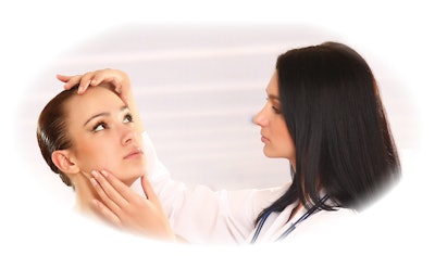 An esthetician working with a patient