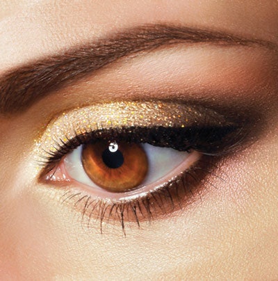 Brown eyes. Brown-eyed clients are lucky, because they look amazing in any color other than the exact brown shade of the eye. Brown incorporates all of the colors on the color wheel, so choosing a complementary shade is easy. Salmon and gold are gorgeous. The key with brown eyes is having enough color intensity, which is why brown eyes look good with rich pigment and smoky hues. Darker brown eyes look larger when applying violet or silver eyeshadows, as they provide contrast to the warm of the brown. Brown eyes can pull off black liner on the waterline as well, since it matches the brown eye intensity. Black mascara or navy mascara is sure to get her brown eyes noticed.