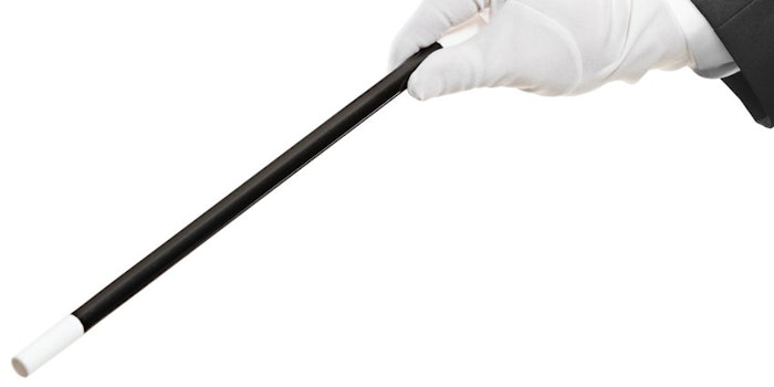 Hand-holding-a-magic-wand_n