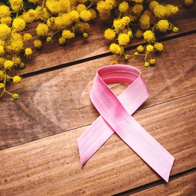 mimosa flower with breast cancer awareness