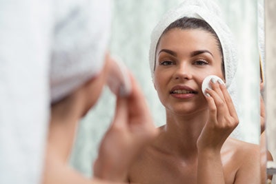 Woman+toning+her+face