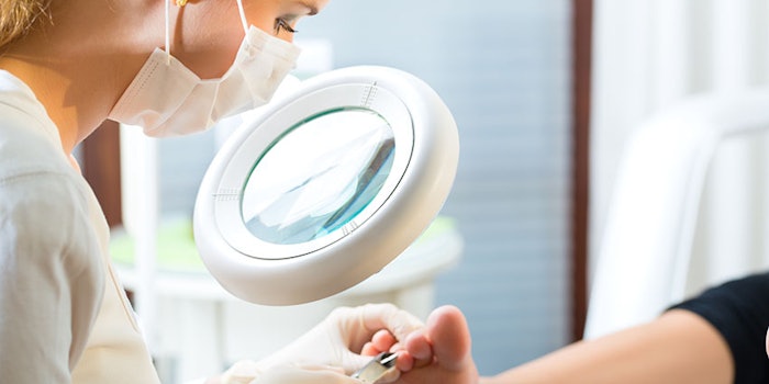 Woman receiving podiatry treatment in a Day Spa