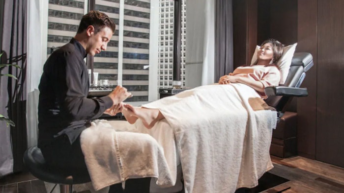 Woman Getting Spa Treatment on Feet