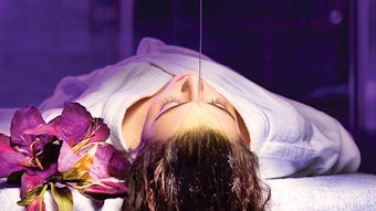 Woman getting ayurvedic treatment