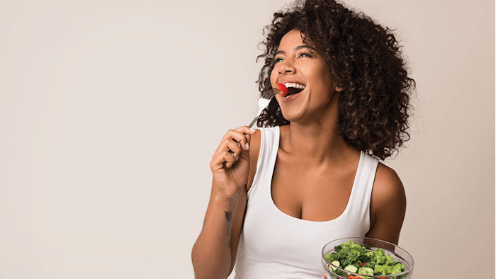 Woman Eating Salad