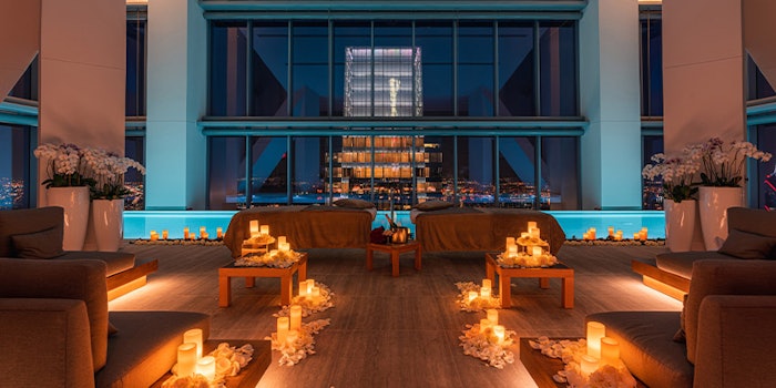 A runway of candles and flowers greets guests as they enter the completely private facility. Photo: Four Seasons.