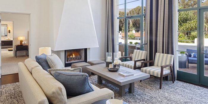 The Moonrise Penthouse Suite's living room with fireplace.