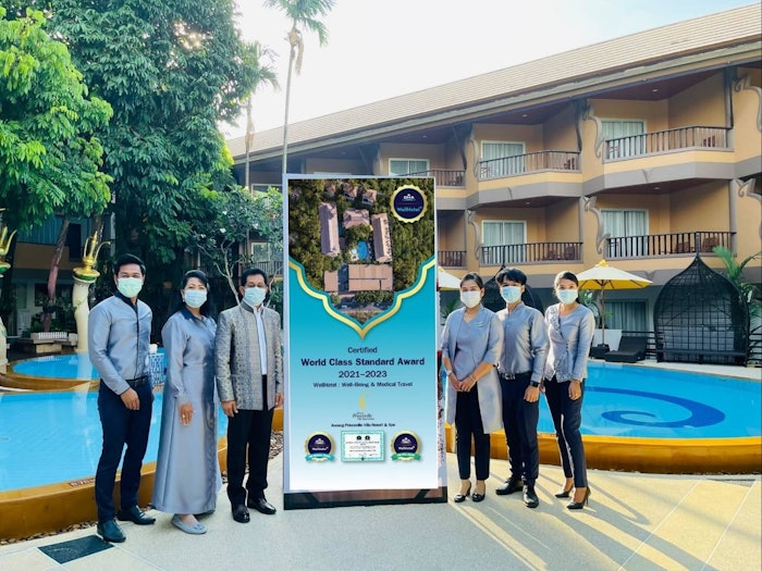 Ms. Kusuma Kinglek, Aonang Princeville Villa Resort & Spa’s Chief Executive Officer and staff after achieving GHA WellHotel Accreditation.