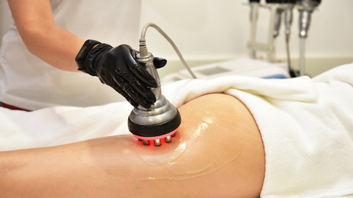 Woman getting body contouring treatment
