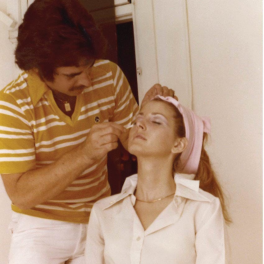 Montague-King working on a client in the 70s.