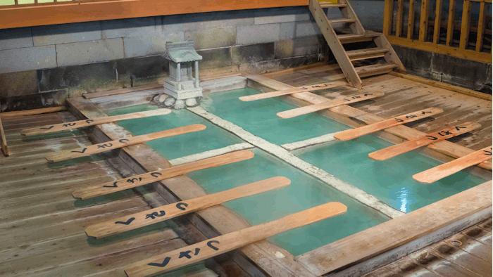 Onsen is balneotherapy that involves prolonged stays in a hot water spring to absorb the healing properties from the mineral-rich water.