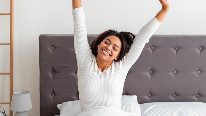 Woman waking up well rested