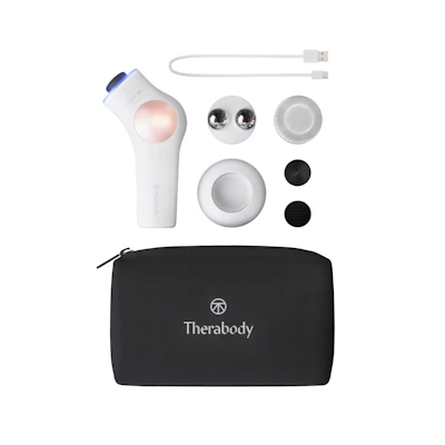 Therabody TheraFace PRO device and attachments on a white background