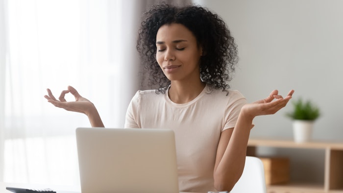 woman in a virtual meditation class