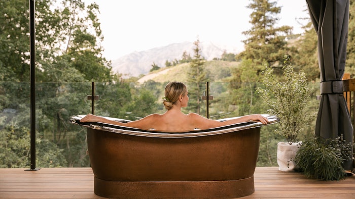 woman at spa alila enjoying wellness service