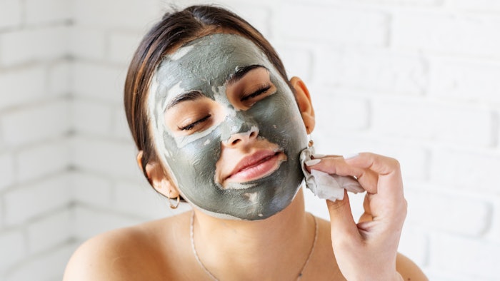 woman enjoying a facial