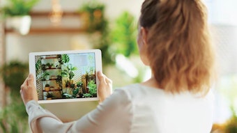 woman shooting video of decorated space