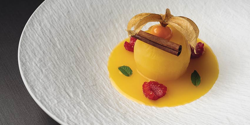 The Orange and Cinnamon Poached Apple is part of Chenot Palace Weggis' Advanced Detox Program.