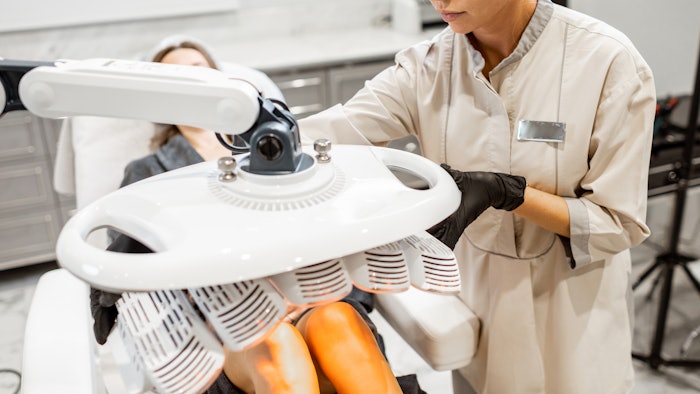 woman receiving LED light therapy