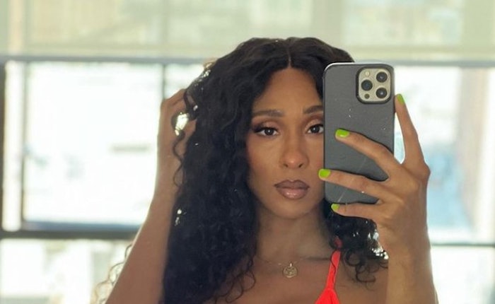 Michaela Jaé Rodriguez rocking a neon green manicure