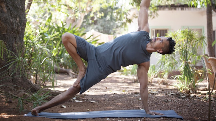 man doing yoga