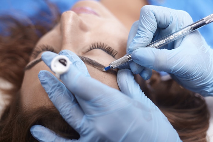 Woman Getting Microblading Service