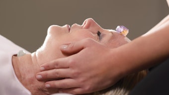 woman receiving reiki treatment