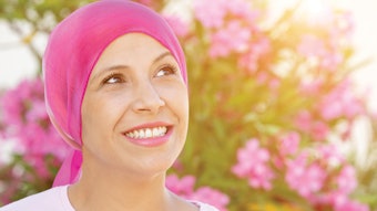 woman suffering from illness relaxing in natural wellness setting