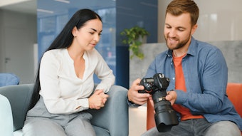professional photographer working with female client