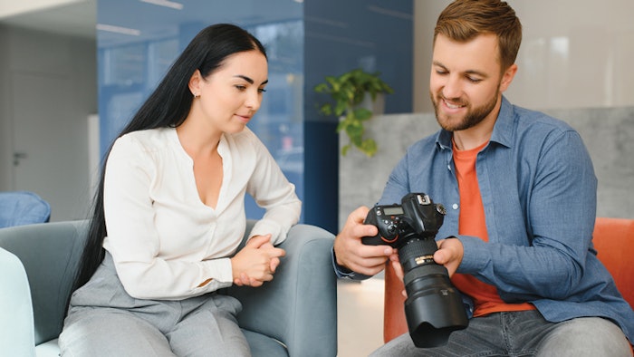 professional photographer working with female client