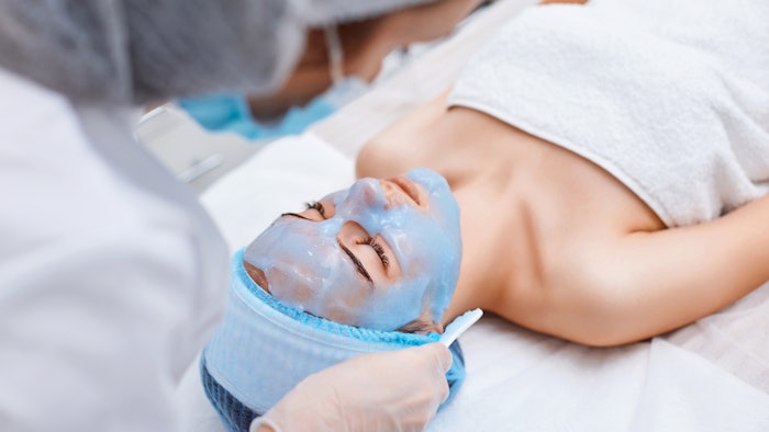 woman receiving spa treatment