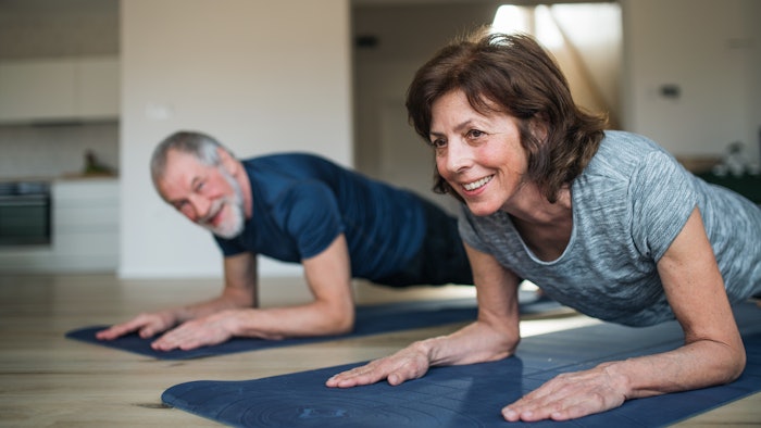 old couple working out at home