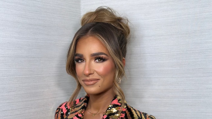 Jessie James Decker rocks a fun updo by celebrity hairstylist Frankie Calire.